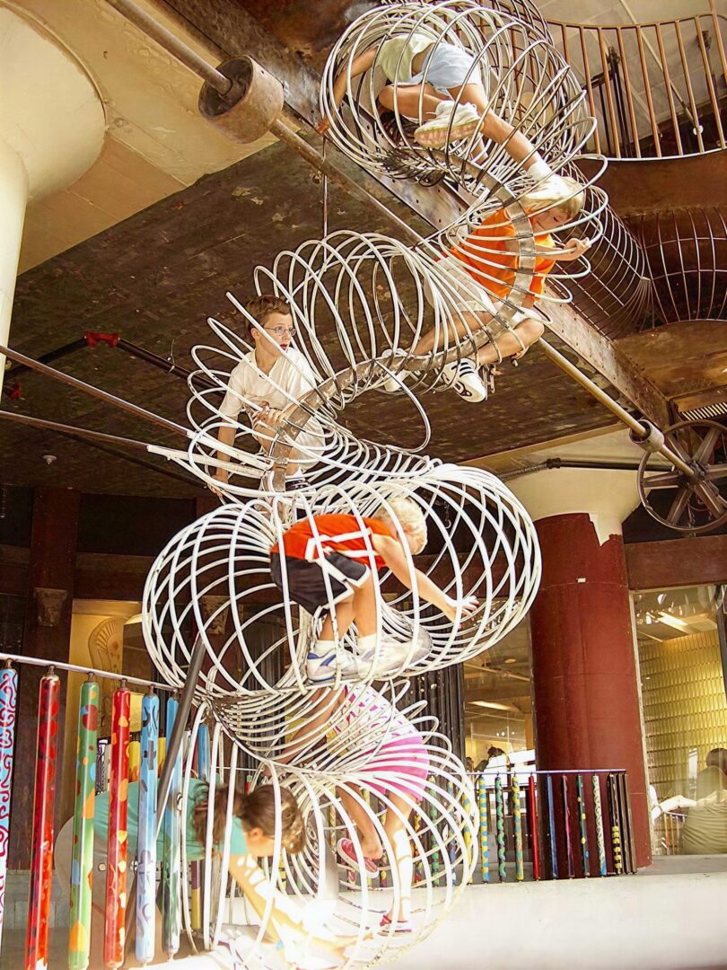 Indoor playground with spiral climbing feature