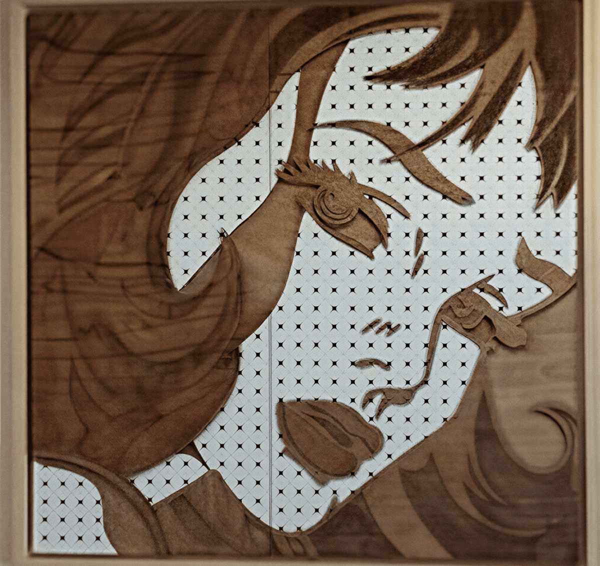 Wooden portrait with intricate carved details