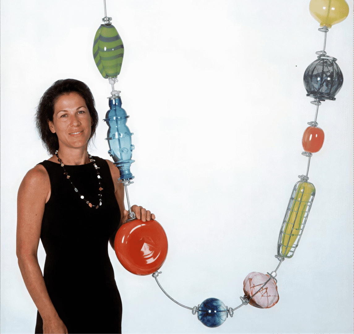 Woman with giant decorative bead necklace