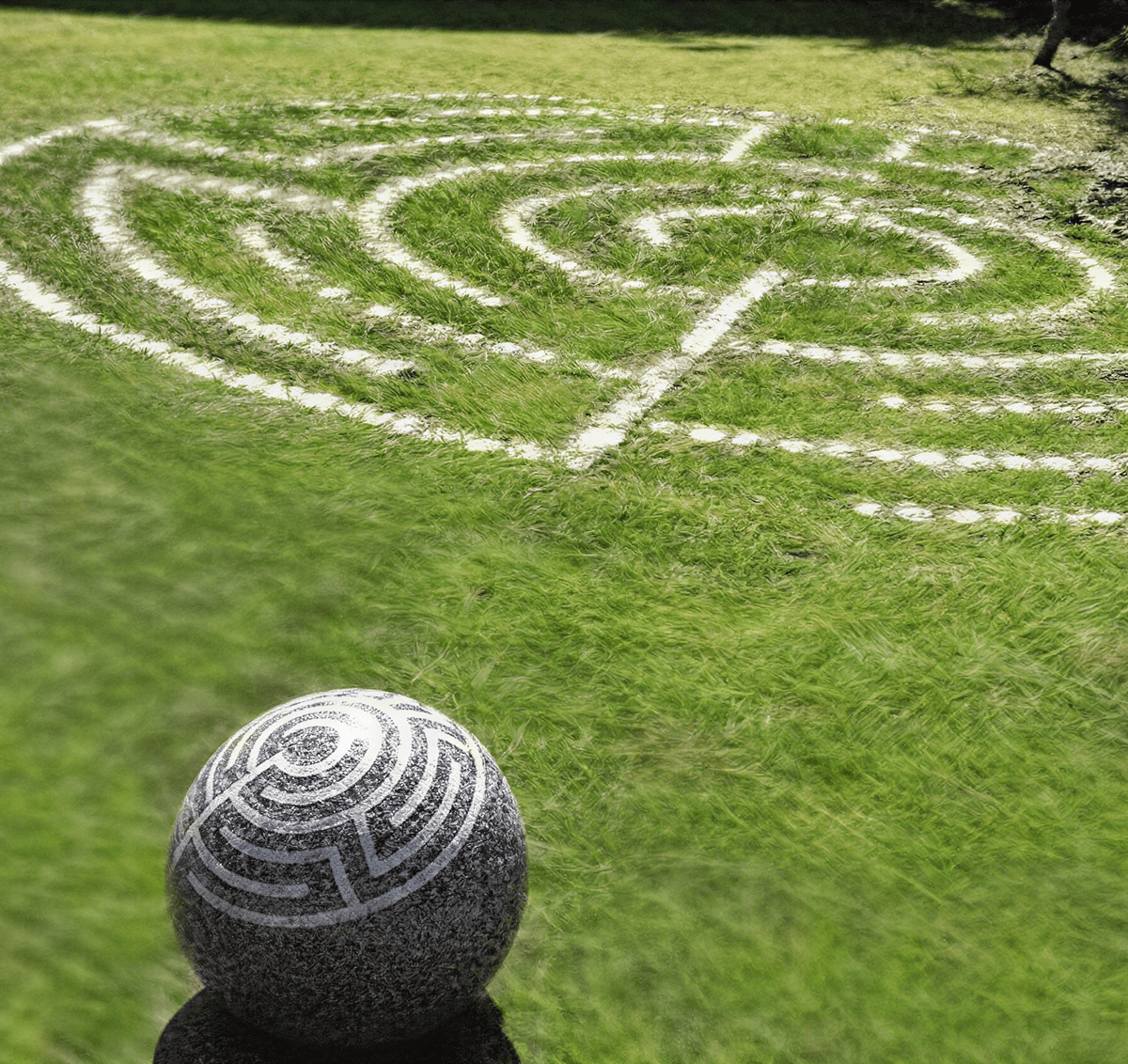 Grass maze with decorative stone ball