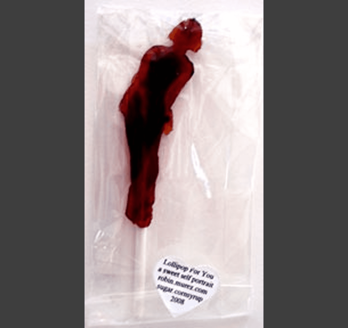 Red lollipop in human shape