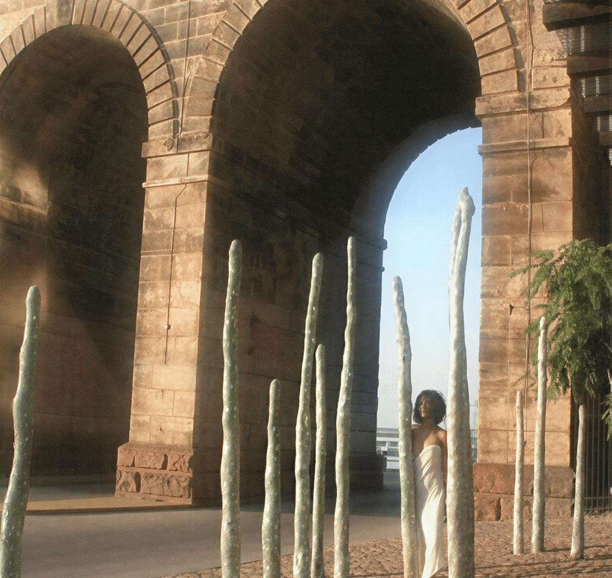 Stone arches with tall sculptures