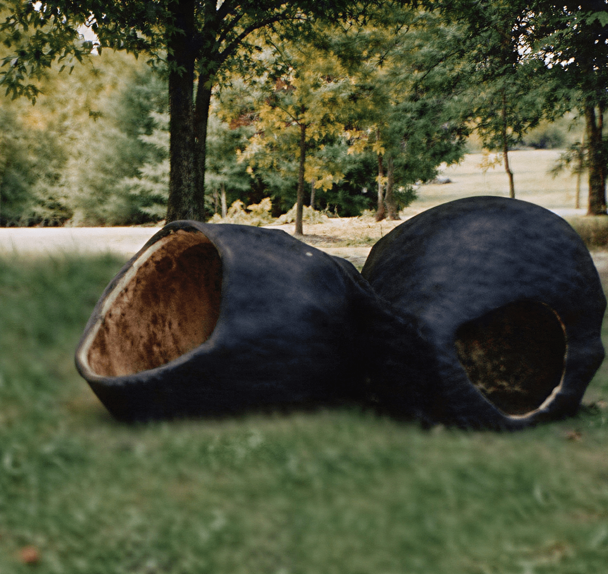 Black stone structures in park setting