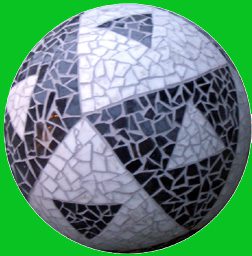Mosaic-patterned sphere on green background.