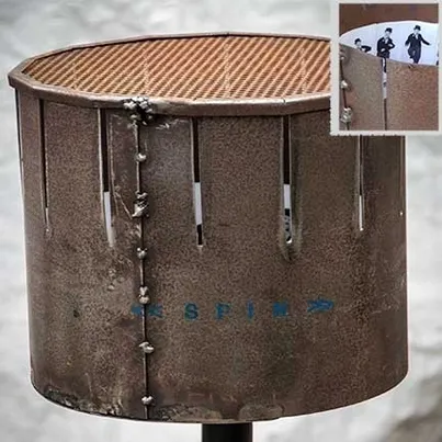 Rusty zoetrope with spinning animation inside.