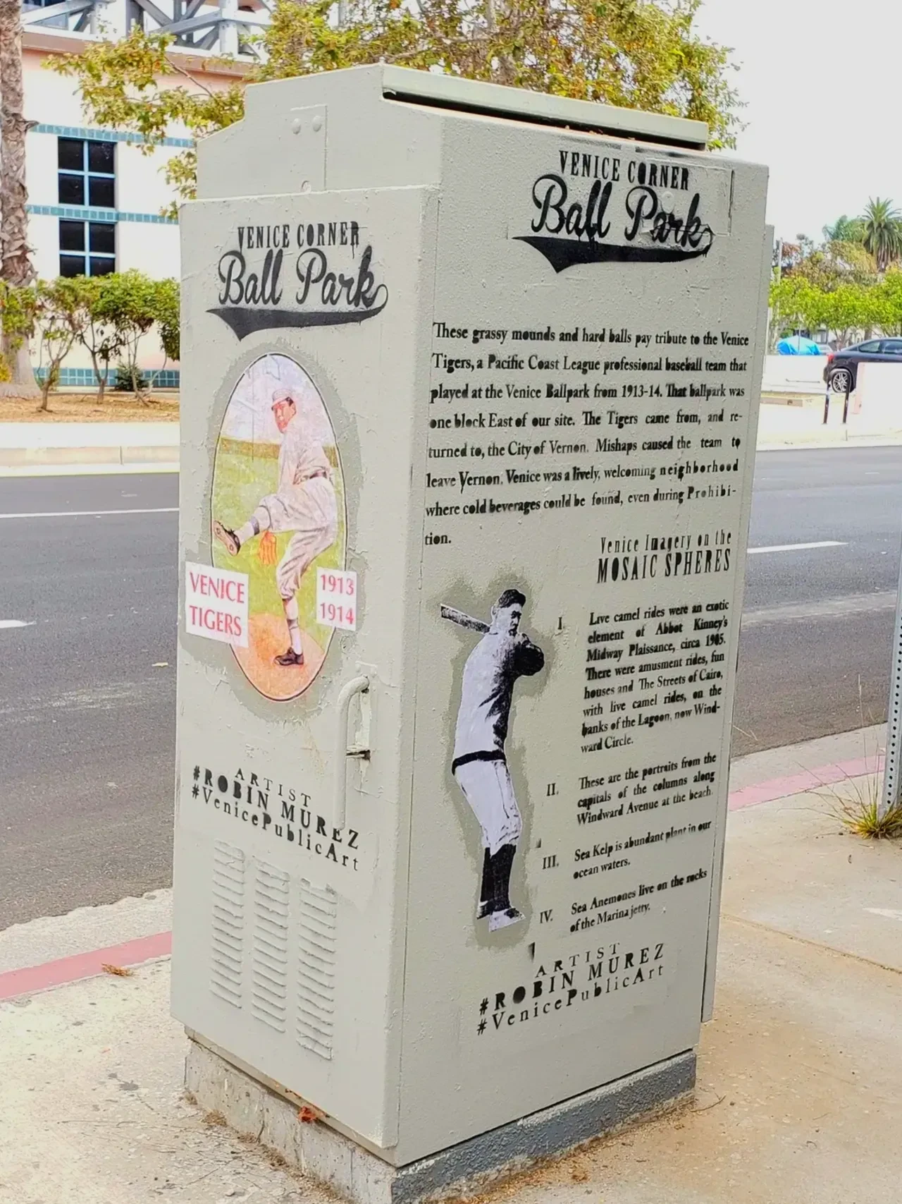Utility box with vintage baseball artwork.