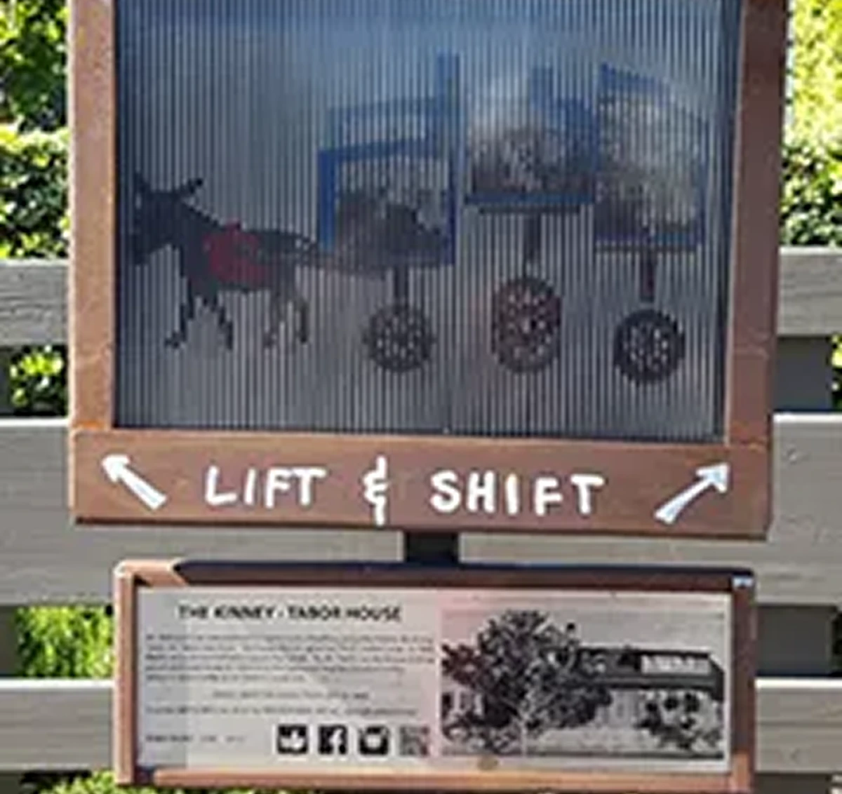 Lift and Shift" sign with information panel.