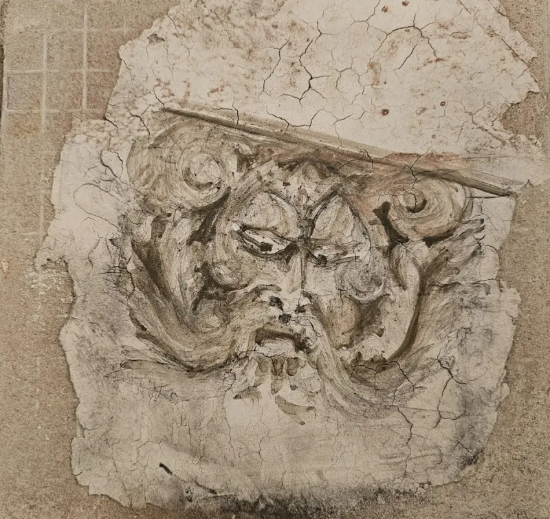 Weathered stone sculpture with facial features
