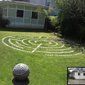 Garden with white stone spiral design.
