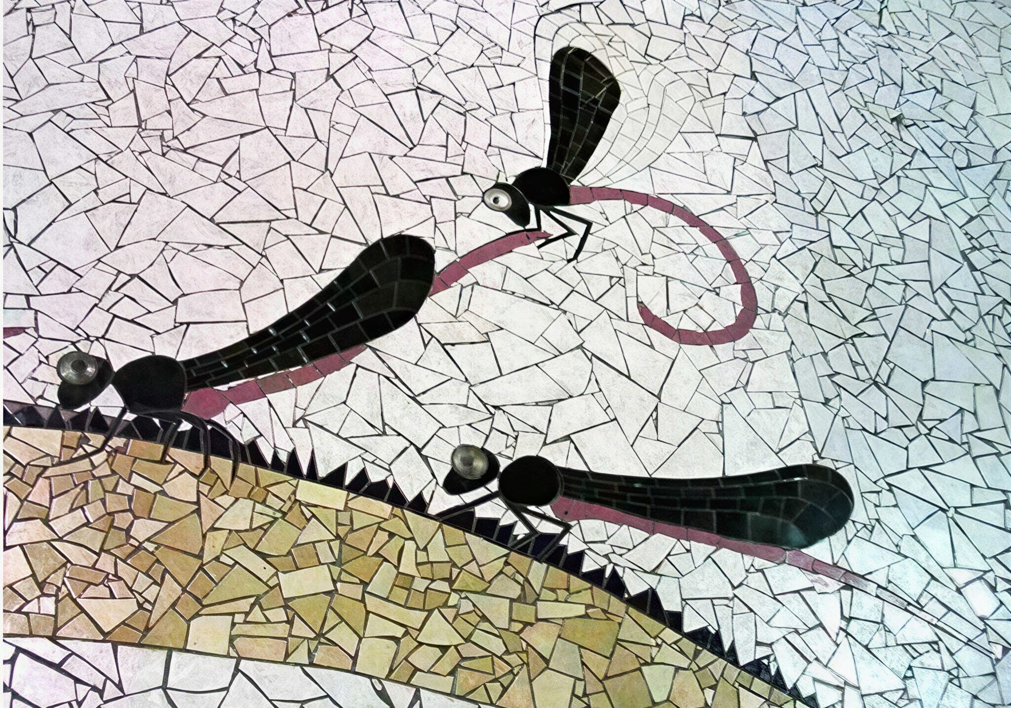 Artistic insect mosaic with detailed design
