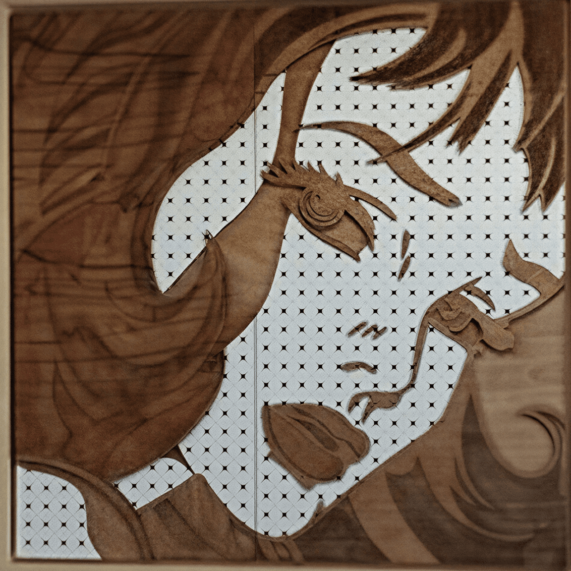 Wooden portrait with intricate carved details