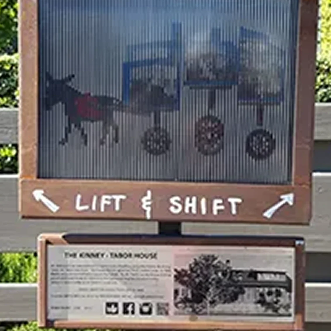 Lift and Shift" sign with information panel.