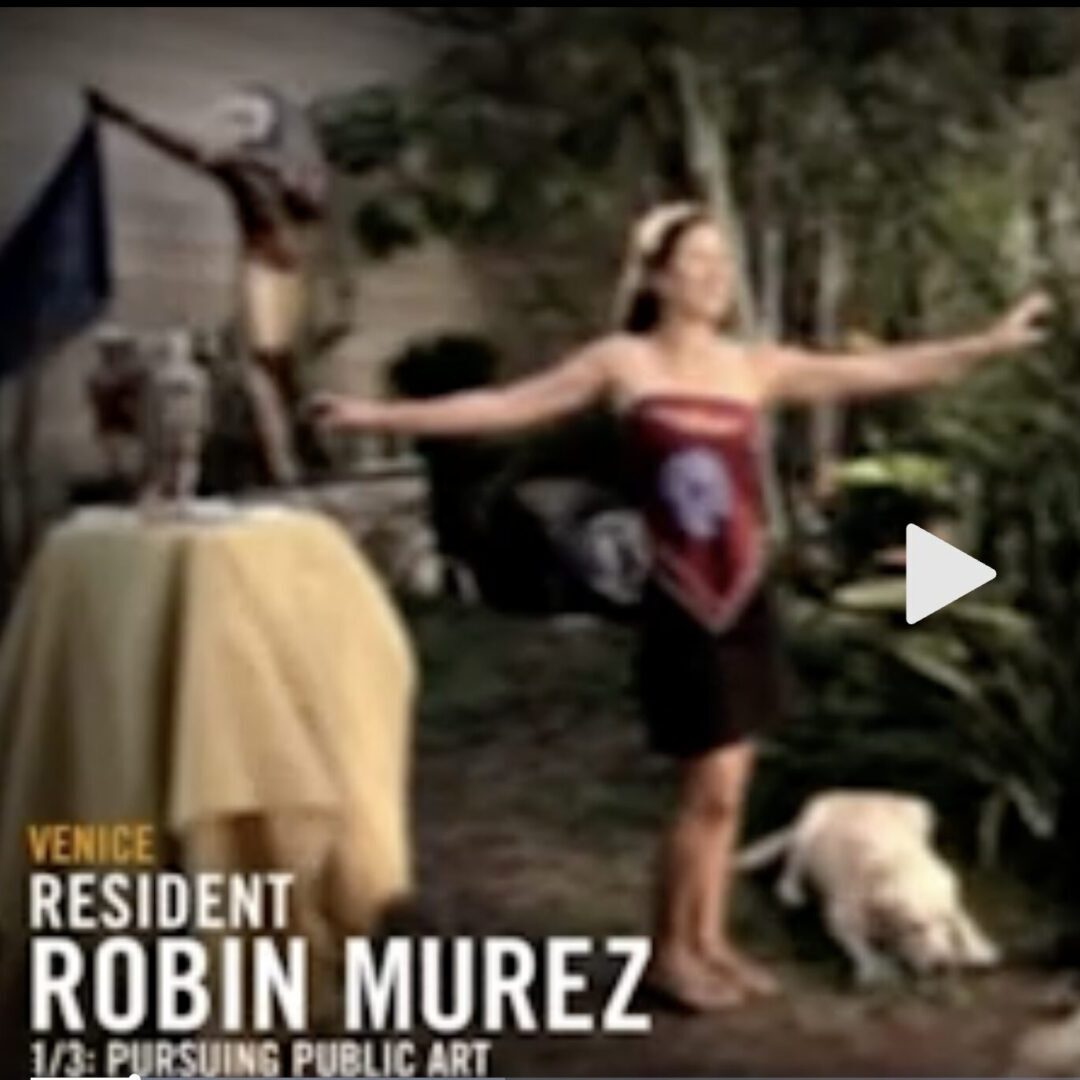 Woman with outstretched arms beside dog in garden