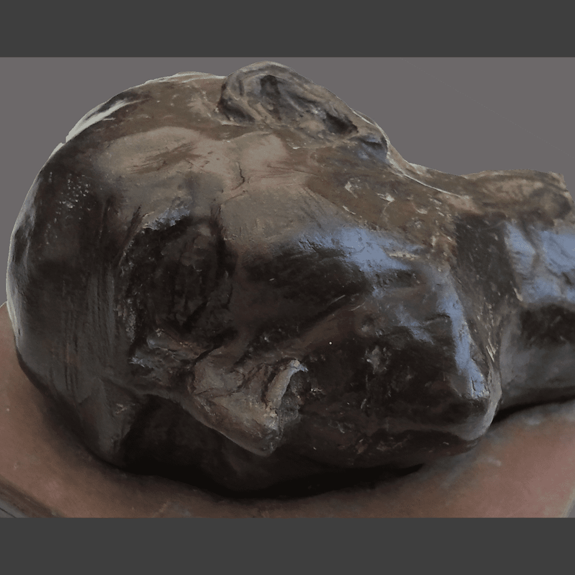 Bronze feline sculpture on plinth